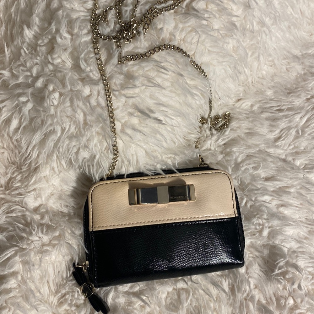 Victoria’s Secret Crossbody wallet 2.5 x 4 in. Fair condition.
